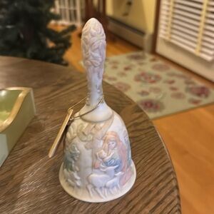 Holy treasures by LEFTON beautiful bell. New condition. Would make a great gift.